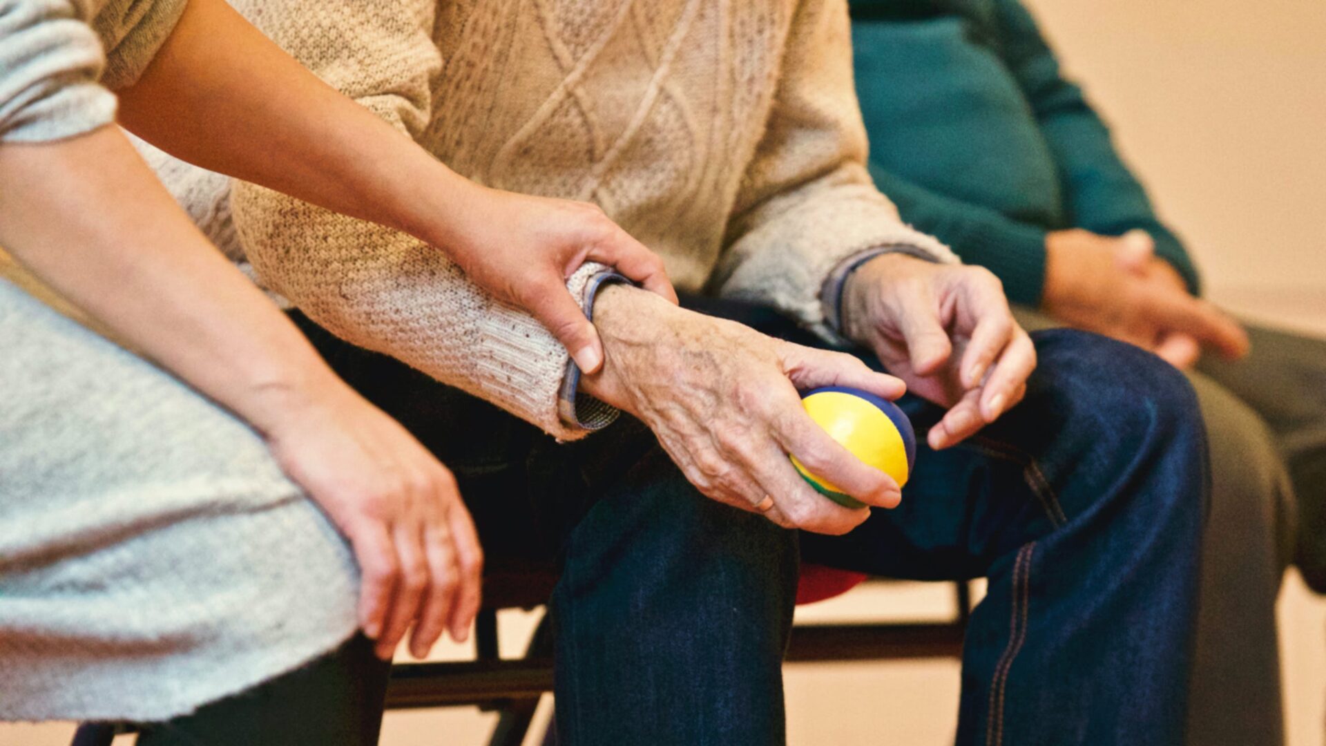 hand giving another hand a lemon