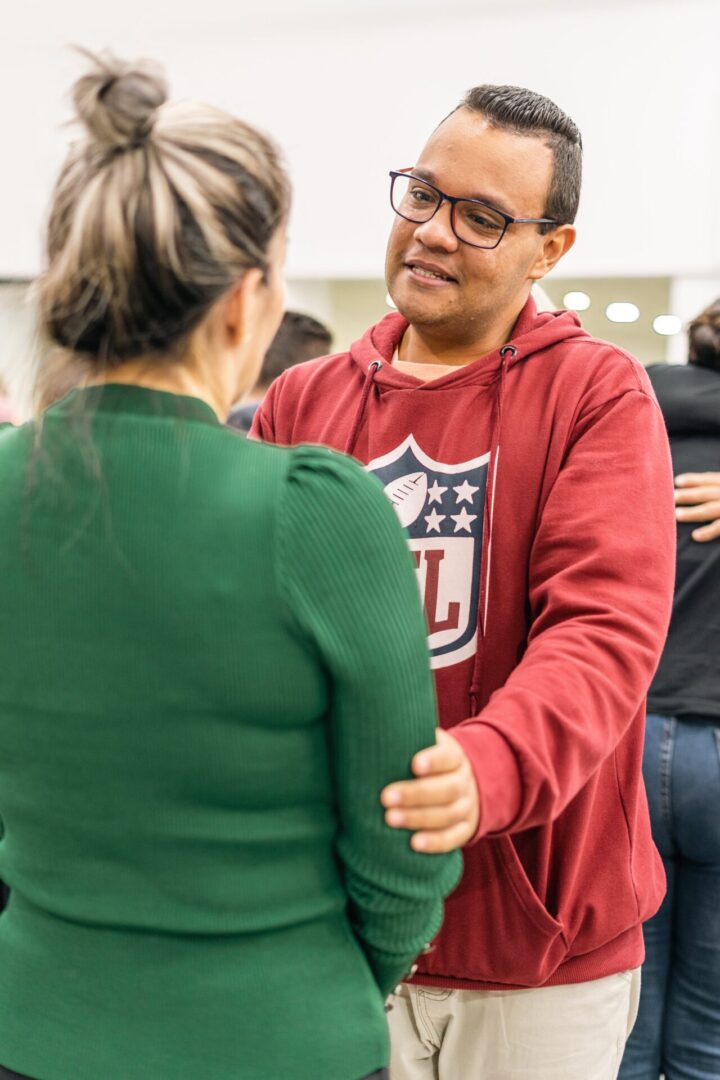 man and woman facing each other