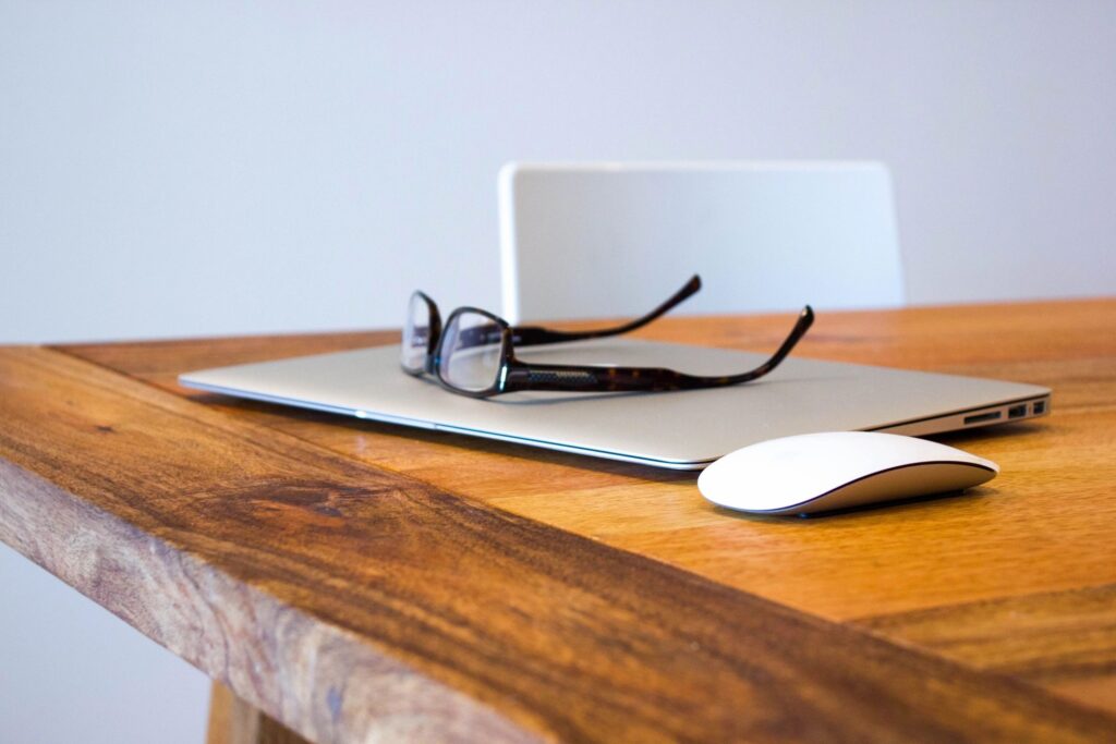 table with eyeglasses on top