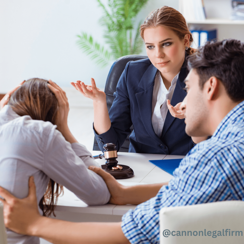 frustrated couple with attorney, woman is clutching her hair