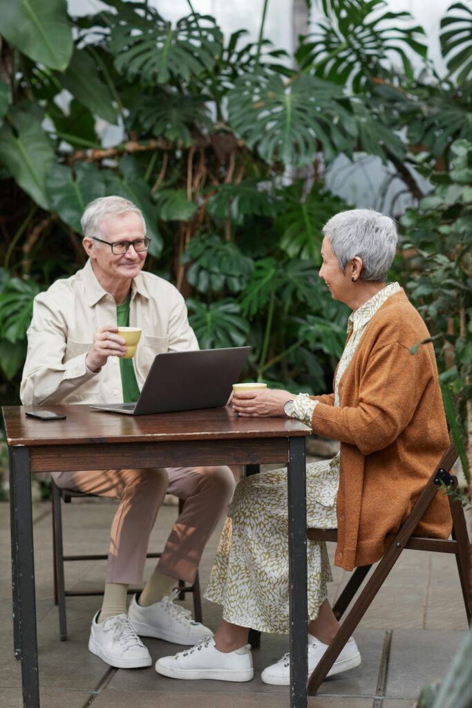 man and woman sitting at a table