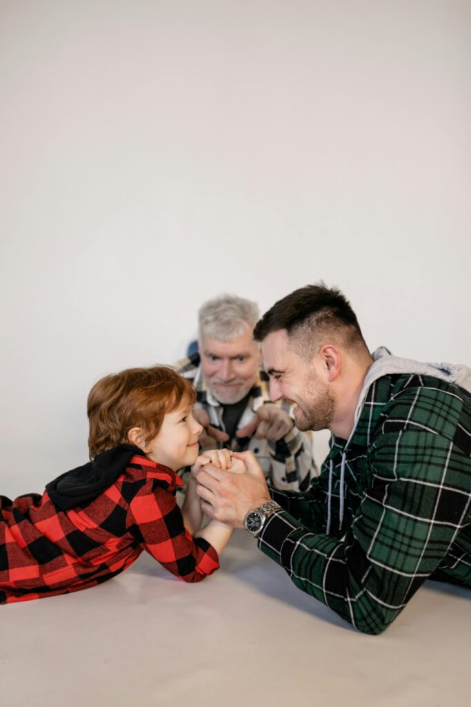 Father with grandson holding hands